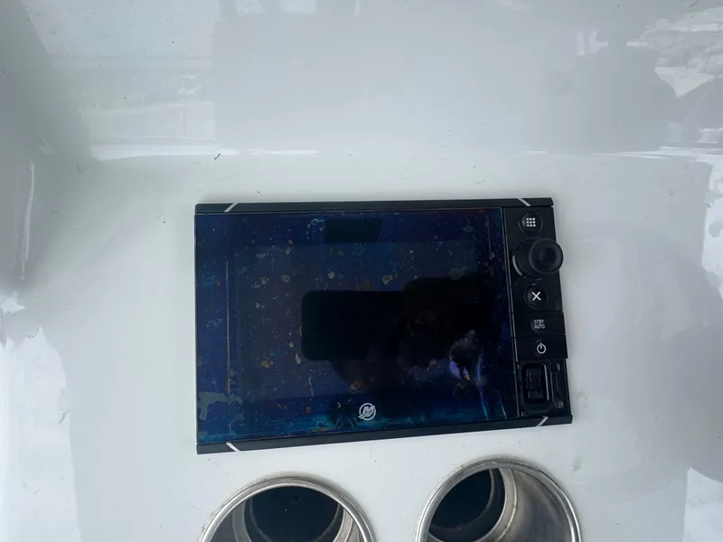 Slide: The Image of Control panel on a 2017 Yellowfin 39 Offshore boat dashboard. - 8