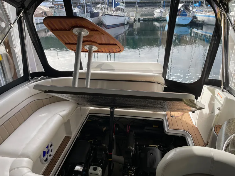 Slide: The Image of Interior of a 2006 Four Winns 350 boat with open engine compartment. - 22