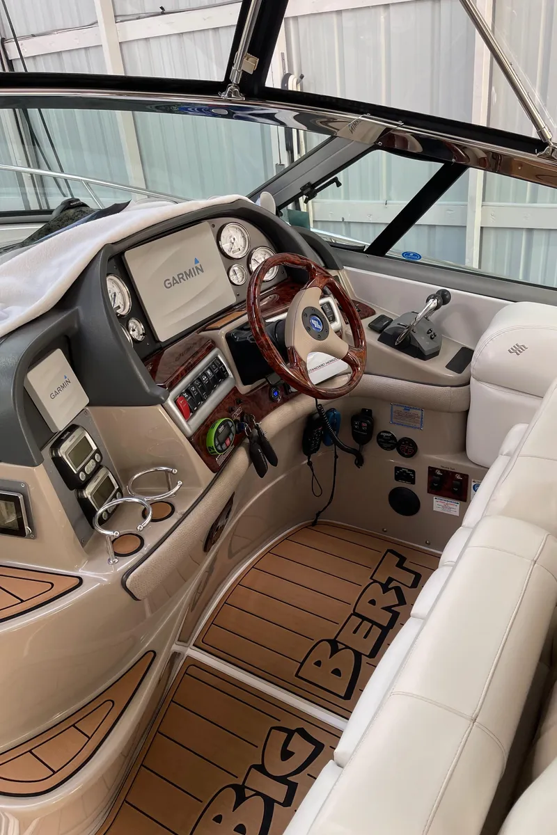 Slide: The Image of Luxurious interior of 2006 Four Winns 350 yacht with plush seating and ambient lighting. - 33