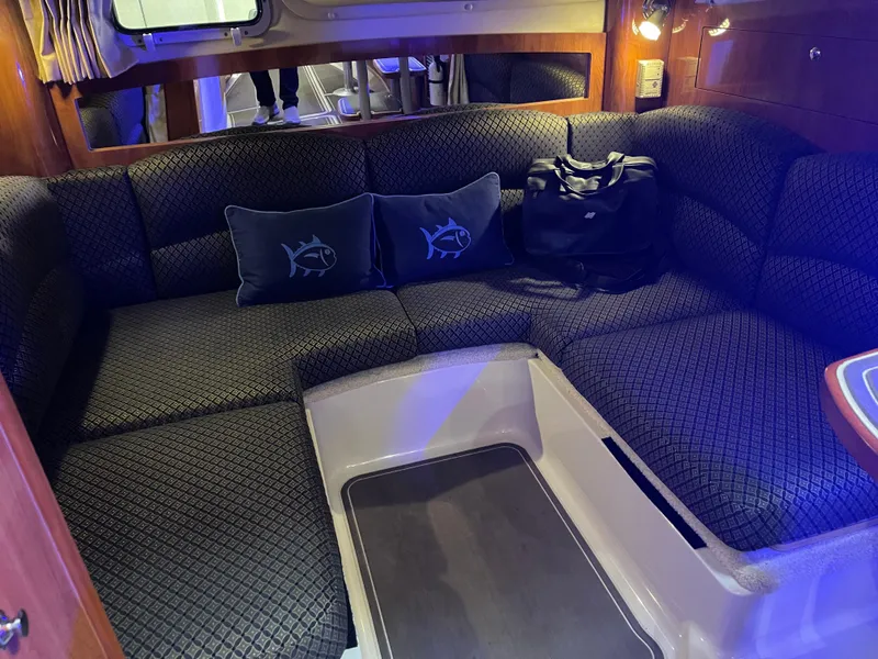Slide: The Image of Luxurious interior of 2006 Four Winns 350 yacht with plush seating and ambient lighting. - 36