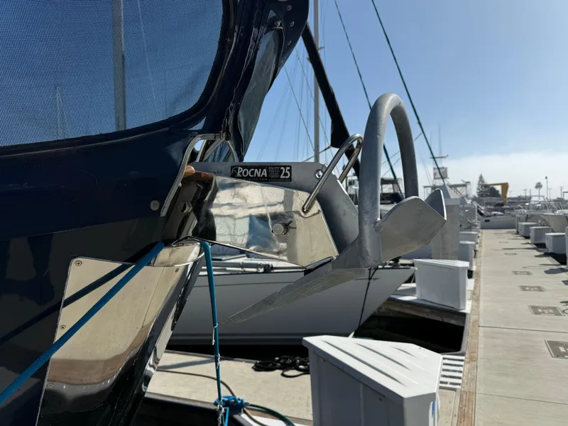 Slide: The Image of 1978 Fisher 38 Trawler with Rocna anchor docked at marina. - 15