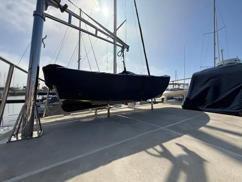 Slide: The Image of Covered boat on deck of 1978 Fisher 38 Trawler in marina. - 34