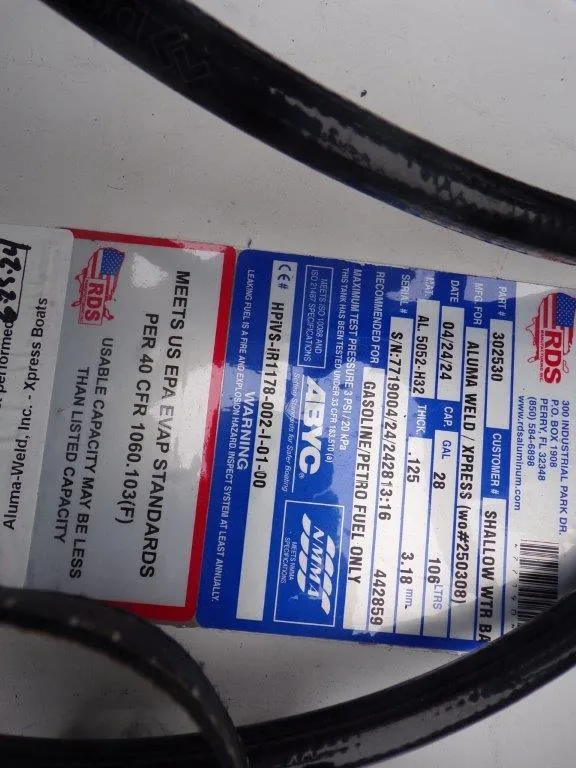 Slide: The Image of Label on Xpress SW20B 2025 model, showing specifications and compliance details. - 28