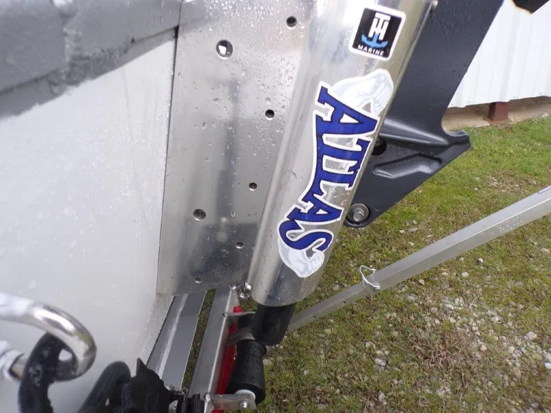 Slide: The Image of Close-up of 2025 Xpress SW20B boat with Atlas jack plate. - 4