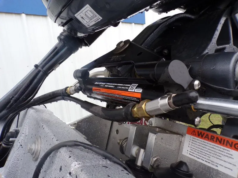 Slide: The Image of Close-up of 2025 Xpress SW20B boat engine components and hydraulic system. - 5