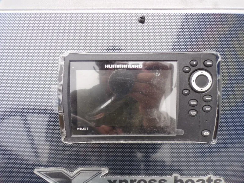 Slide: The Image of Fishfinder display on 2025 Xpress SW20B boat dashboard. - 7