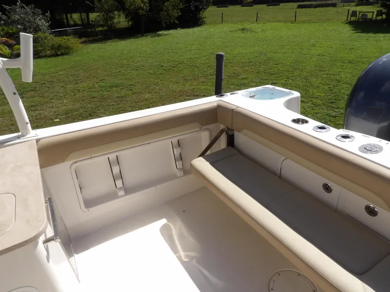 Slide: The Image of 2020 Sailfish 275 DC boat interior with seating and rod holders. - 18