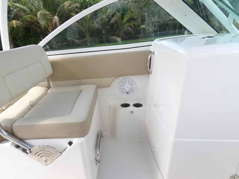 Slide: The Image of Interior of 2020 Sailfish 275 DC boat with seating and cup holders. - 45
