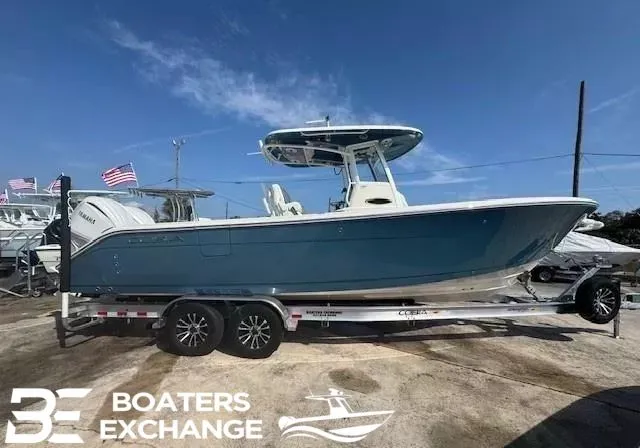The Image of 2025 Cobia 285 Open Center Console on trailer at Boaters Exchange. - 1