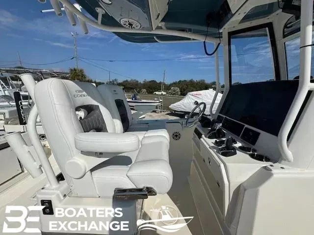 Slide: The Image of 2025 Cobia 285 Open Center Console boat interior view. - 7