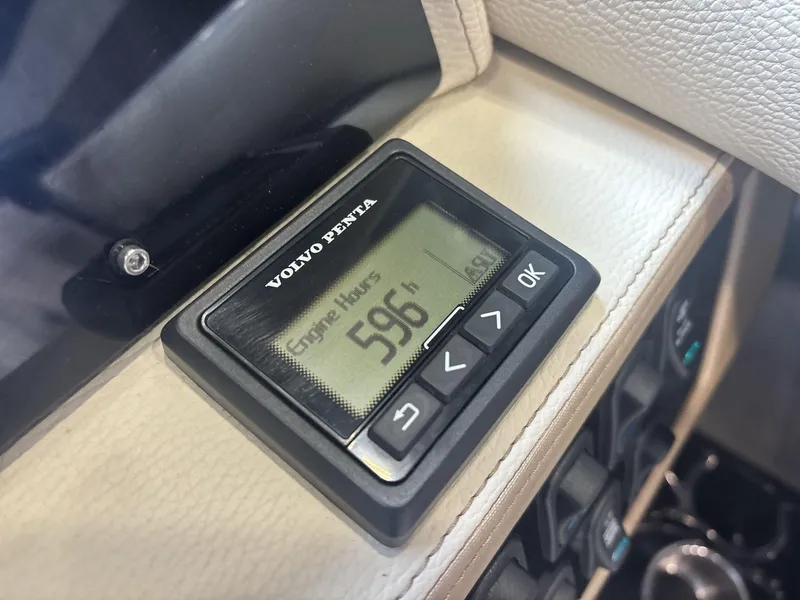 Slide: The Image of Volvo Penta engine hour meter showing 596 hours on a 2019 Regal 2300 RX Surf. - 16