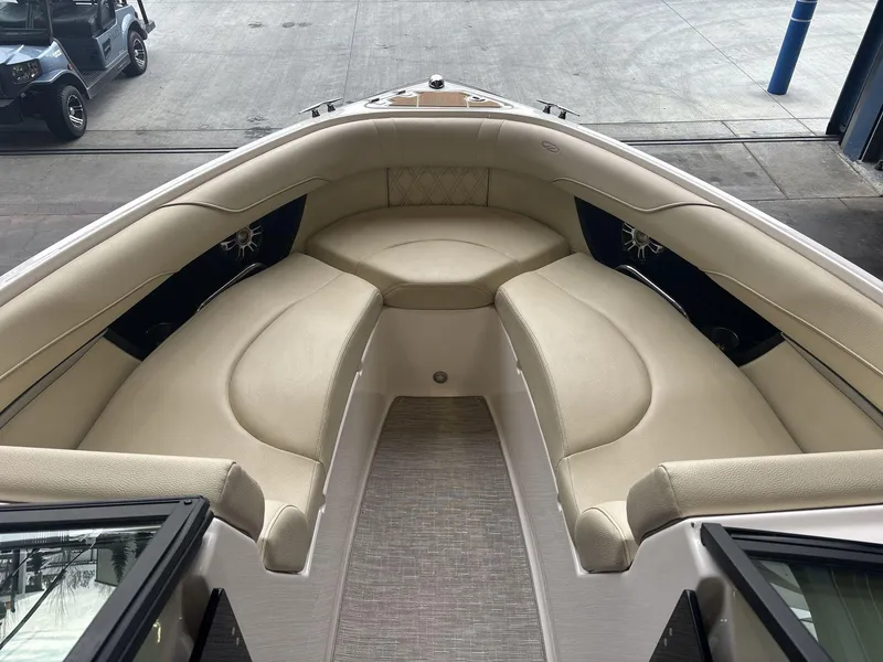 Slide: The Image of 2019 Regal 2300 RX Surf boat interior with beige seating and modern design. - 7