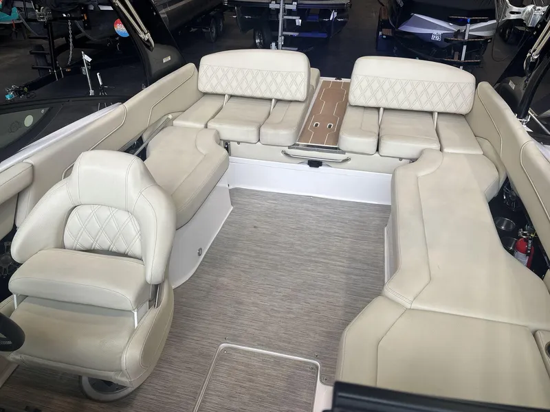 Slide: The Image of 2019 Regal 2300 RX Surf boat interior with beige seating and modern design. - 8