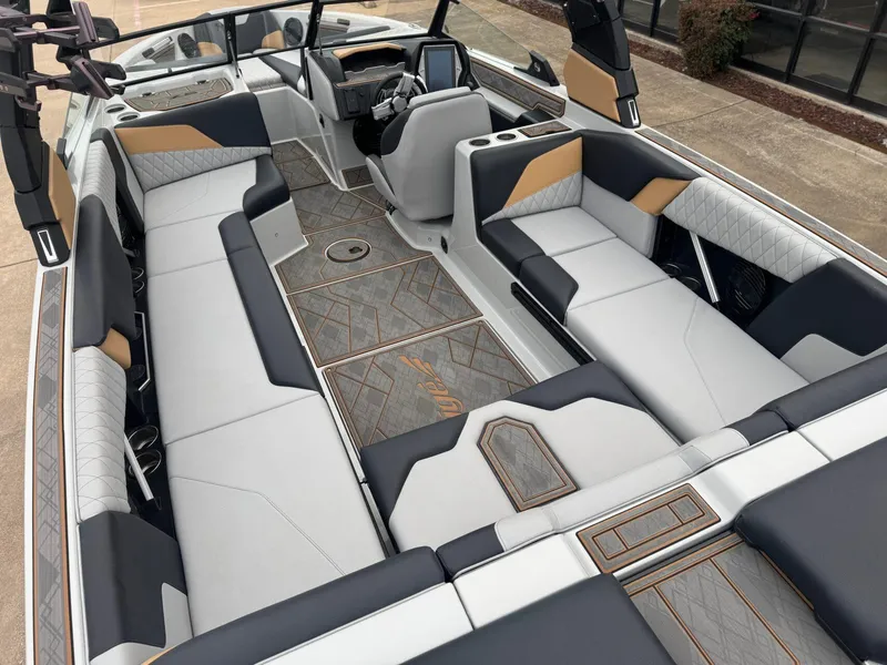 Slide: The Image of 2023 Tigé Z5 boat interior with luxurious seating and modern design. - 10