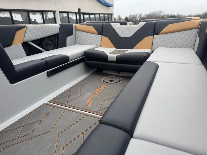 Slide: The Image of 2023 Tigé Z5 boat interior with stylish seating and modern design. - 13
