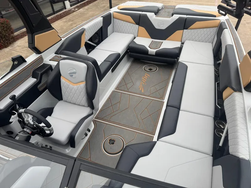 Slide: The Image of 2023 Tigé Z5 boat interior with luxurious seating and modern design. - 15