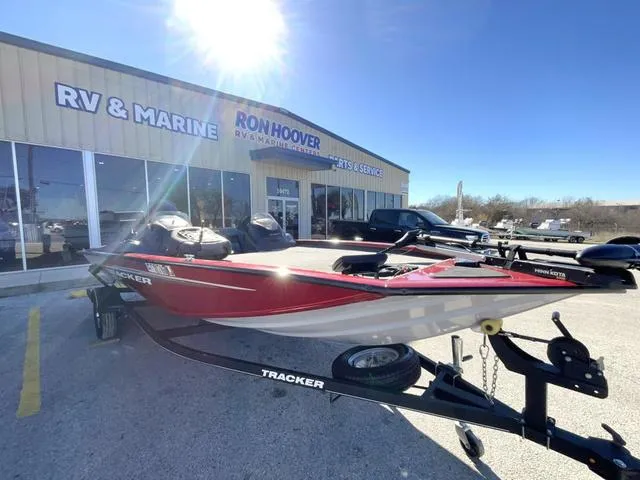 Slide: The Image of 2020 Tracker 195TXW boat on trailer outside Ron Hoover RV & Marine dealership. - 3