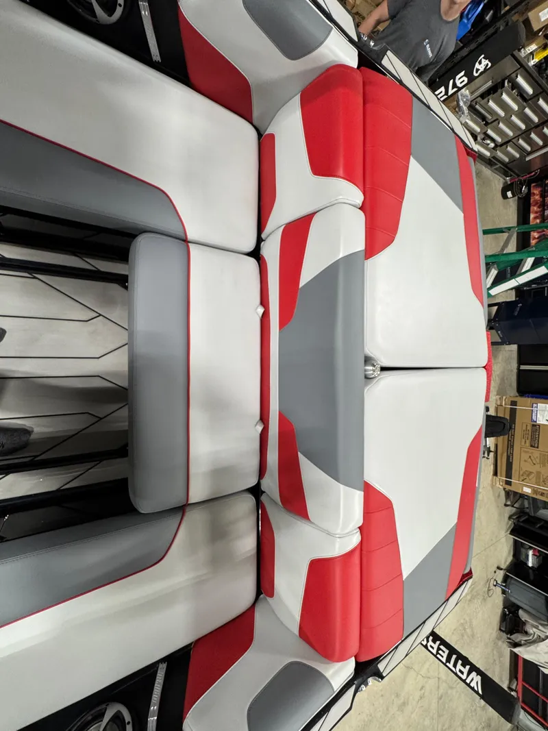 Slide: The Image of 2020 Malibu Wakesetter 22 LSV interior with red, gray, and white seating. - 11