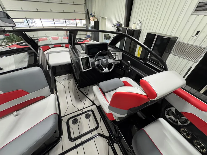 Slide: The Image of 2020 Malibu Wakesetter 22 LSV interior with modern seating and sleek dashboard design. - 15