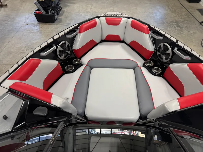 Slide: The Image of 2020 Malibu Wakesetter 22 LSV interior with red and gray seating. - 18