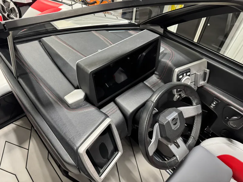 Slide: The Image of 2020 Malibu Wakesetter 22 LSV dashboard with modern steering and digital display. - 20