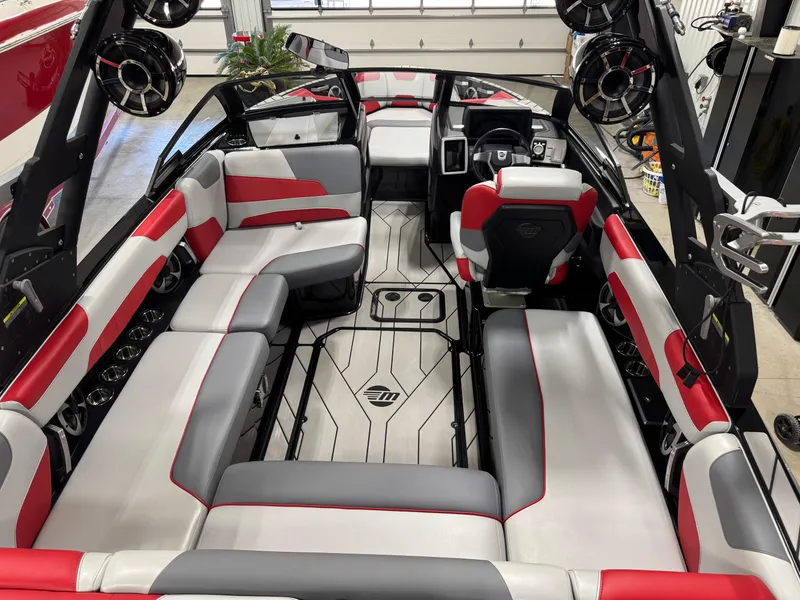 Slide: The Image of 2020 Malibu Wakesetter 22 LSV interior with red and gray seating, modern design. - 22