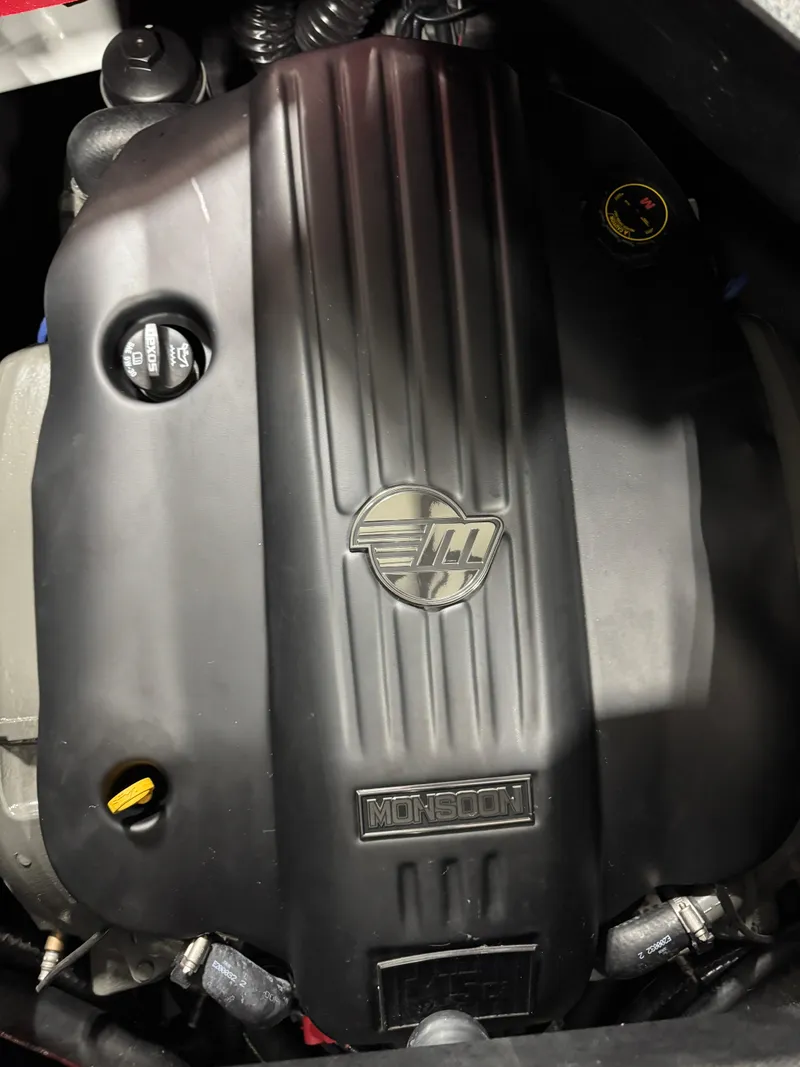 Slide: The Image of 2020 Malibu Wakesetter 22 LSV engine, featuring a sleek black cover with embossed logo. - 7