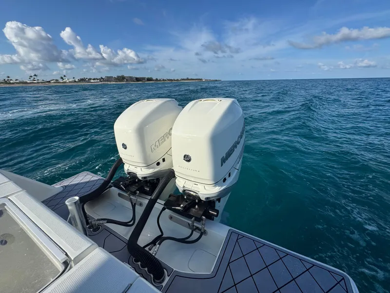 Slide: The Image of 2017 SeaVee 340Z boat with twin outboard motors on open ocean. - 10