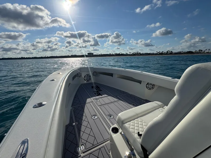 Slide: The Image of 2017 SeaVee 340Z boat on water, sunny day, clear skies, and calm sea. - 22