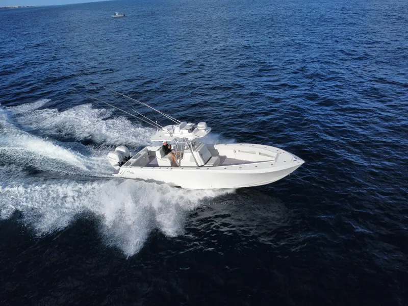 Slide: The Image of 2017 SeaVee 340Z boat cruising on open ocean waters. - 7