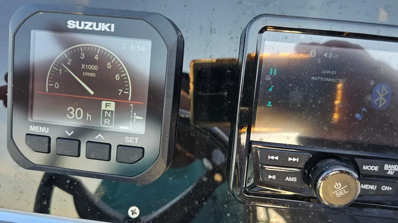 Slide: The Image of Dashboard of a 1992 Talon F-20 with Suzuki gauge and audio system. - 16