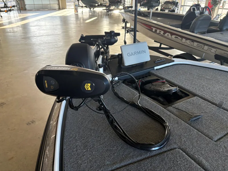 Slide: The Image of 2025 Nitro Z20 XL Pro boat with Garmin navigation system and trolling motor. - 2