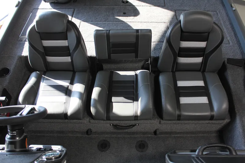 Slide: The Image of 2025 Ranger RT188P boat interior with three black and gray seats. - 7