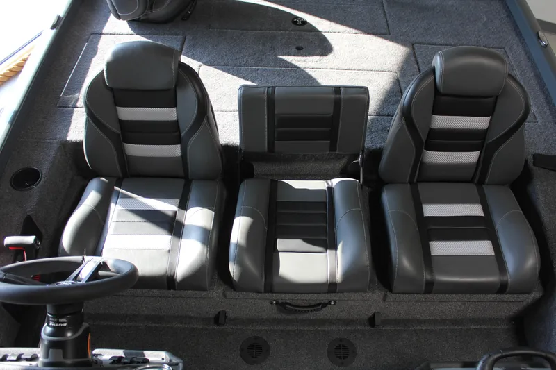 Slide: The Image of 2025 Ranger RT188P boat interior with three black and gray seats. - 9