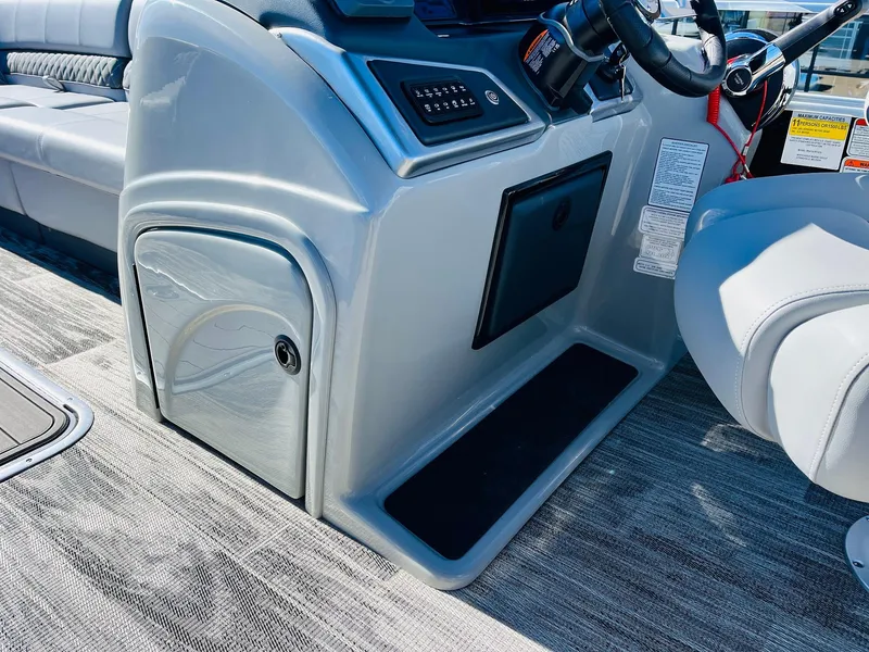 Slide: The Image of 2025 Ranger Reata 223C boat interior with sleek console and seating. - 29