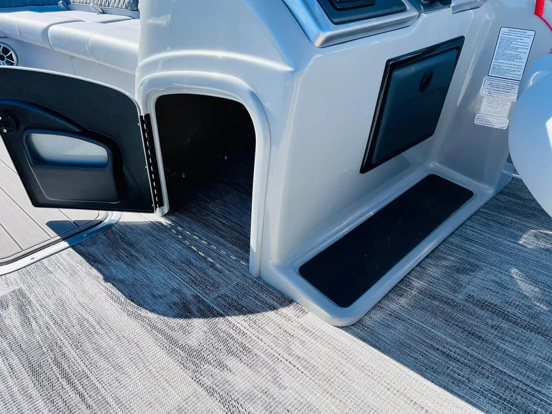 Slide: The Image of 2025 Ranger Reata 223C boat interior, featuring sleek design and modern amenities. - 30