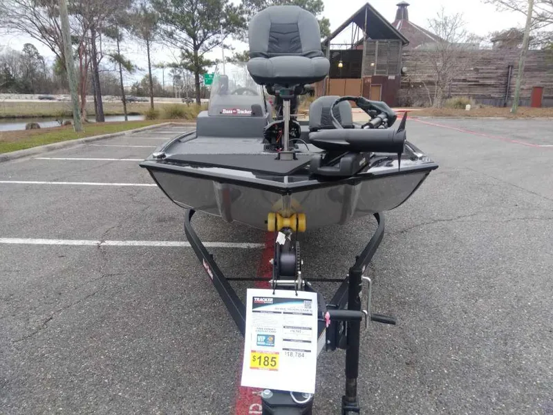 Slide: The Image of 2025 Tracker Bass Tracker Classic XL boat on trailer in parking lot. - 6