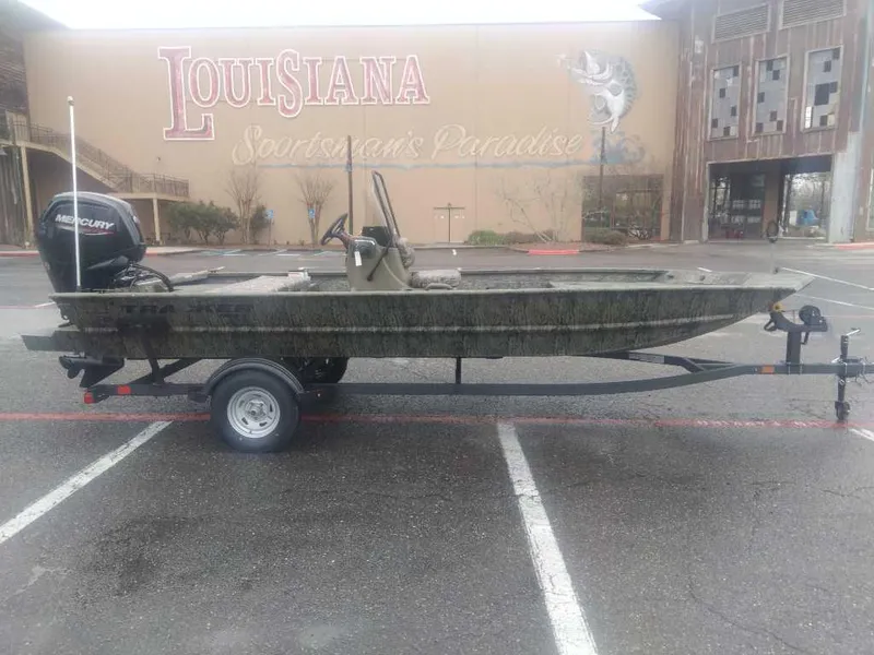 Slide: The Image of 2025 Tracker Grizzly 1860 CC boat on trailer, parked in Louisiana. - 4