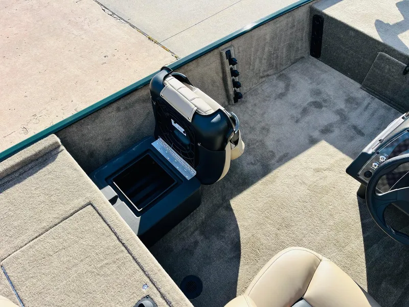 Slide: The Image of 2025 Tracker Bass Tracker Classic Limited boat interior with seating and storage. - 20