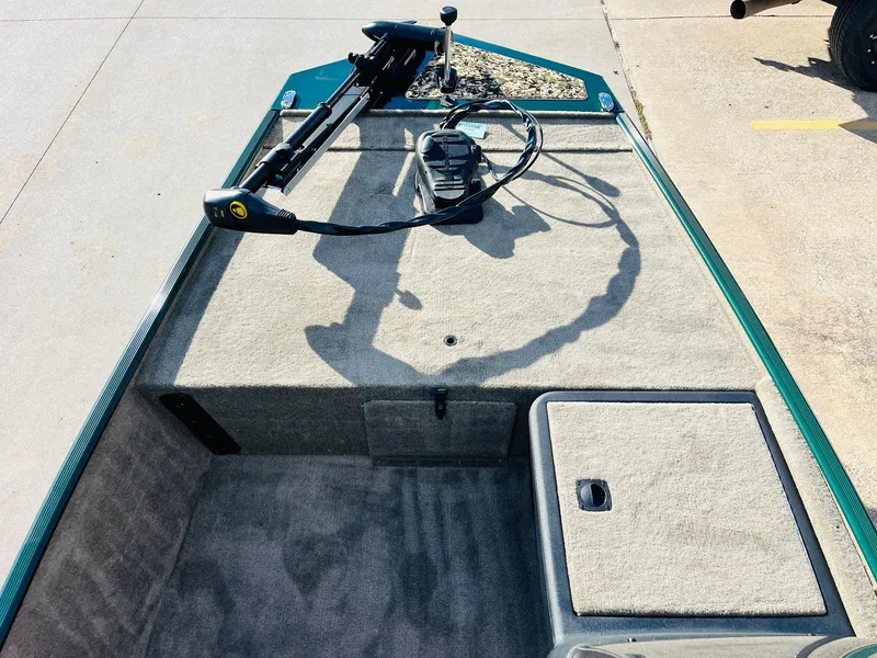 Slide: The Image of 2025 Tracker Bass Tracker Classic Limited boat deck with trolling motor. - 9