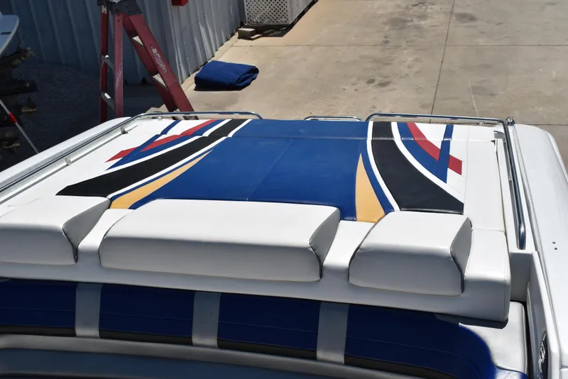 Slide: The Image of 2008 Formula 353 FASTech boat with colorful deck design. - 13