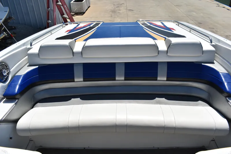Slide: The Image of 2008 Formula 353 FASTech boat interior with blue and white seating. - 14