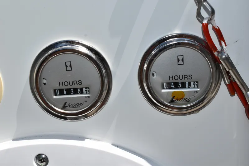 Slide: The Image of Close-up of hour meters on a 2008 Formula 353 FASTech boat dashboard. - 29