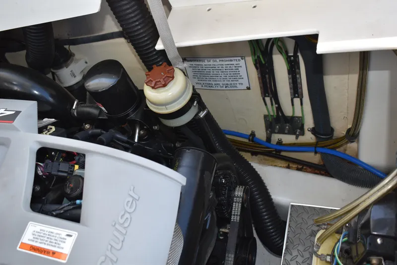 Slide: The Image of Engine compartment of a 2008 Formula 353 FASTech boat, showing various components and wiring. - 47
