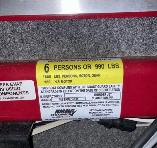 Slide: The Image of 2019 Thunder Jet 185 Explorer capacity label: 6 persons or 990 lbs, 150 HP motor. - 8