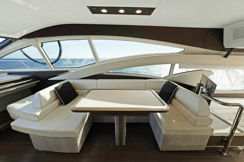 Slide: The Image of Luxurious interior of 2017 Azimut 60 Flybridge yacht with elegant seating and ocean view. - 11