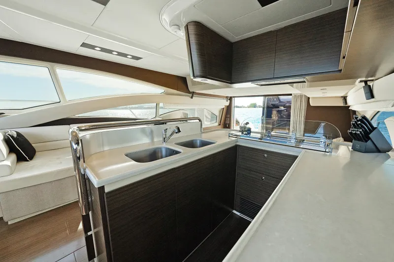 Slide: The Image of Luxurious interior of 2017 Azimut 60 Flybridge yacht with modern kitchen design. - 14