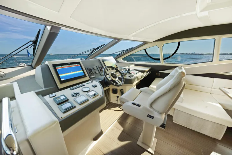 Slide: The Image of Luxurious 2017 Azimut 60 Flybridge yacht cockpit with modern navigation equipment. - 15