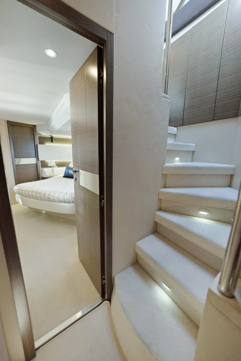 Slide: The Image of Interior of 2017 Azimut 60 Flybridge yacht with stairs and bedroom view. - 18