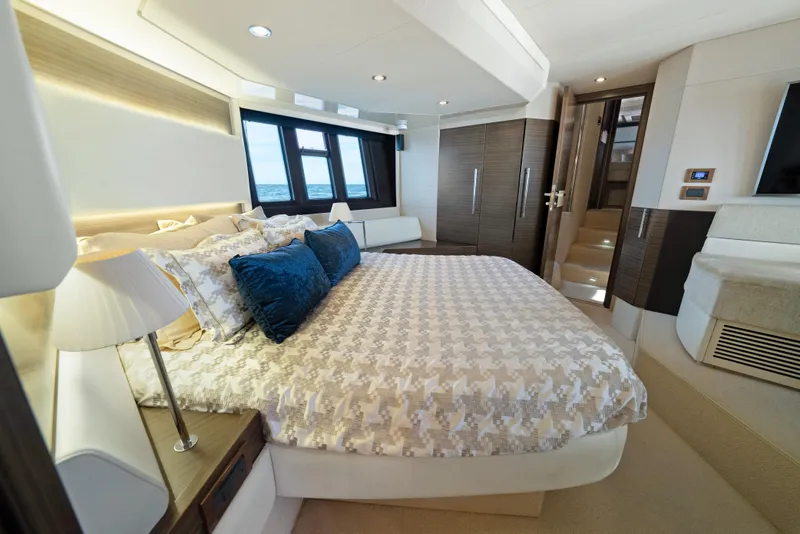 Slide: The Image of Luxurious bedroom interior of 2017 Azimut 60 Flybridge yacht with modern design and cozy bedding. - 19